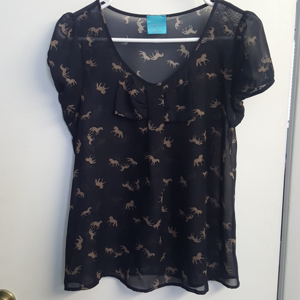 See-through top in black with horses pattern